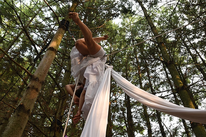 Otros Rostros Perform Dancing From Ropes in Trees