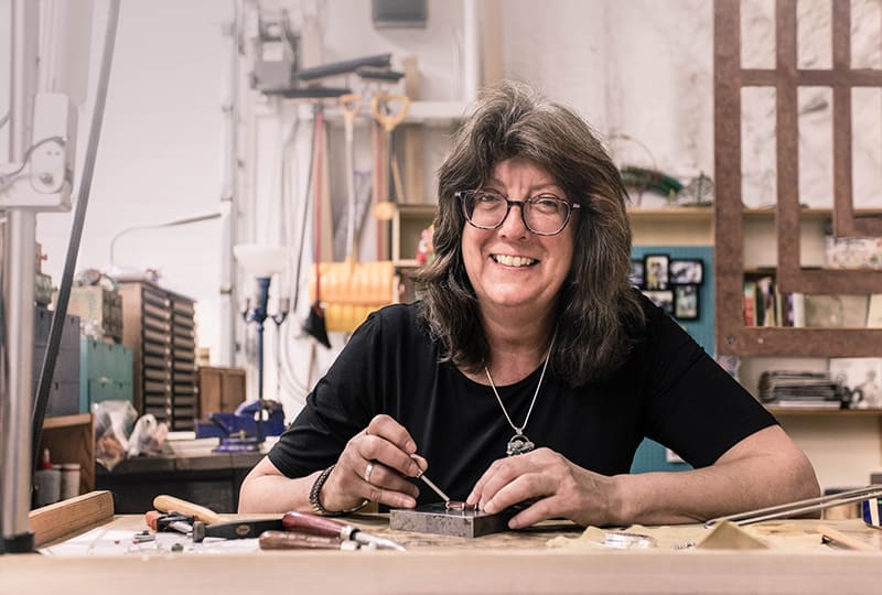 Jeannine Rosenberg, Uxbridge jewellery artist working on a piece